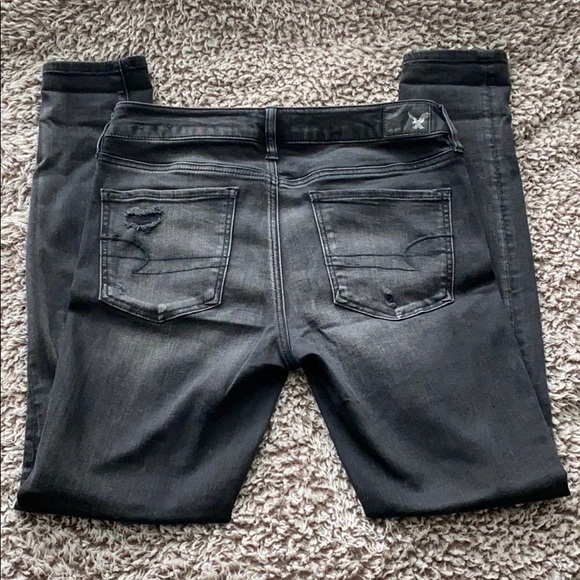 AE Super Stretch Black Distressed Jeggings - Picture 2 of 6